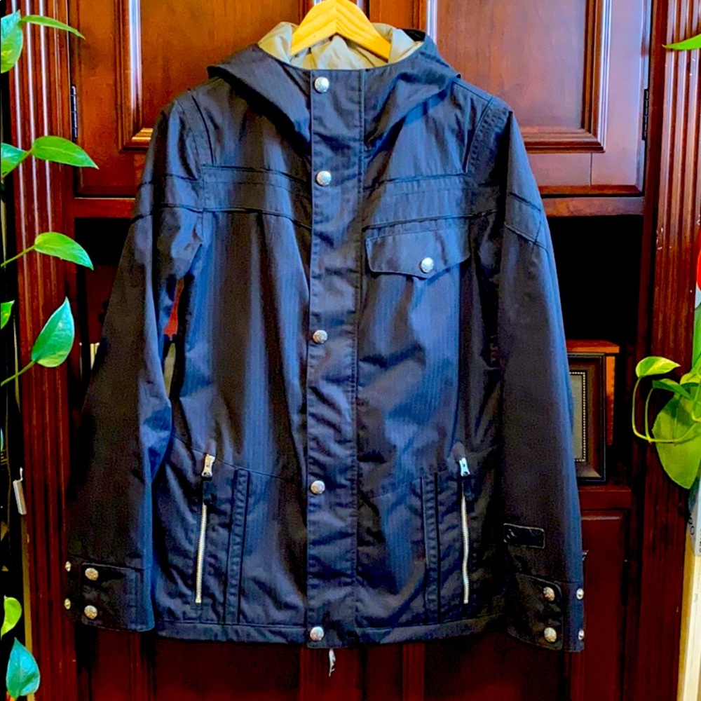 Medium Burton dry ride snowboard jacket.